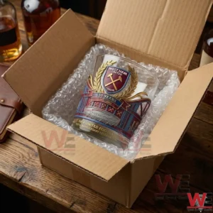 West Ham United's 130th Anniversary Whiskey Glass 3 An open cardboard box containing a West Ham anniversary glass protected by bubble wrap!