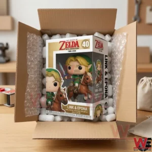 A packaged Zelda anniversary figure nestled inside a cardboard shipping box with protective foam and bubble wrap!