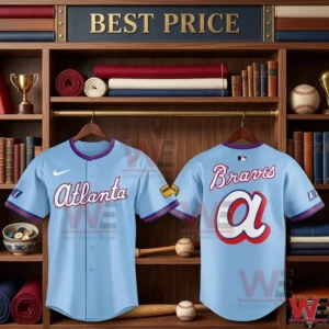 Two light blue baseball jerseys showing the Atlanta front and Braves back designs hanging in a decorative wooden bookcase.