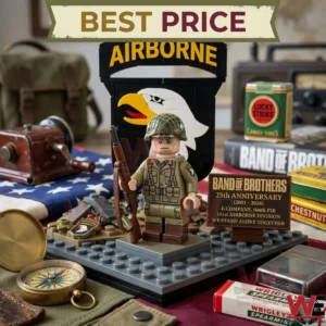 Small soldier toy on a base with an Airborne logo and military gear scattered around the wooden table!