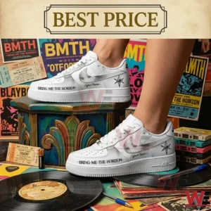 A person wearing custom white band sneakers standing on a decorative stool and a vinyl record surrounded by music memorabilia!