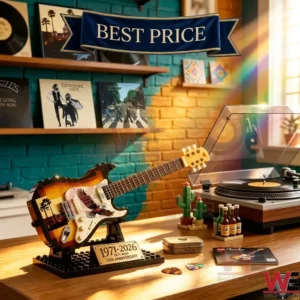 Toy guitar on a desk with a record player!