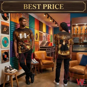 A full length photo of two black models in a music lounge and studio! One model on the left faces forward to show the front of a custom black t shirt featuring a bold white text of The R&B Tour and a photo of Chris Brown and Usher! The other model on the right faces away to display the back of the matching shirt back which features white text for Chris Brown and Usher and a silhouette photo of them with a crowd! The background has shelves of records and sneakers!