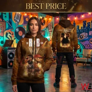 A full length photo of two black models standing side by side in a vibrant music record room with colorful graffiti walls and shelves of records and equipment! The model on the left faces forward showing the detailed back of a custom designed graphic hoodie with a silhouette of Chris Brown and Usher and concert crowd below it! The model to her right faces forward to display the front of the matching hoodie which has large white text for The R&B Tour and a photo of Chris Brown and Usher! Both are in full length poses and wear casual clothing and accessories with sneaker style shoes!