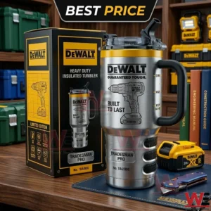 A close up of a limited edition DeWalt stainless steel tumbler with a drill engraving next to its box on a desk with a battery and knife!