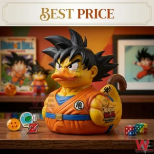 A collectible rubber duck dressed as Goku with spiky black hair and an orange uniform sitting on a desk with anime accessories!