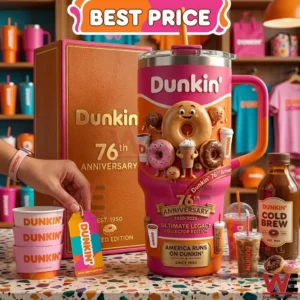 A highly detailed Dunkin 76th anniversary tumbler with 3D donut art displayed on a counter with its collector box and coffee accessories.