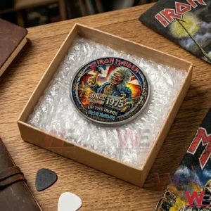 High angle shot of a commemorative music coin inside an open shipping box with protective packaging!