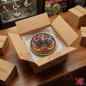 Iron Maiden 50th Anniversary Coin 5 Collectible gold coin inside a shipping box with protective bubble wrap!