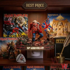 A close up of a lit Iron Maiden 50th Anniversary night light with a soldier mascot figurine on a shelf!
