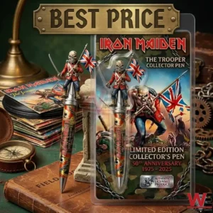 A commemorative Iron Maiden pen with an Eddie figurine on top shown with its collector packaging and vintage accessories on a wooden table!