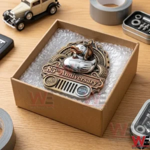 Jeep 85th Anniversary Rubber Duck Badge 5 Metallic duck emblem inside an open shipping box!