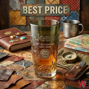 Engraved Jeep anniversary glass on a wooden table with a compass and journal!