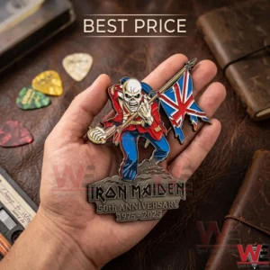 Iron Maiden fiftieth anniversary metal emblem being held by a person!