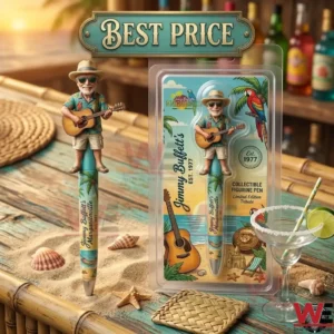 A Jimmy Buffett collector pen and its packaging displayed on a tropical bar with a margarita glass and sand!