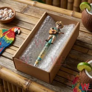 Top view of a Jimmy Buffett themed pen inside a shipping box on a bamboo bar counter with tropical drinks!