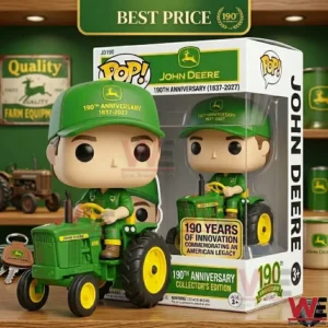 A John Deere anniversary collectible figure on a tractor next to its packaging on a wooden shelf!