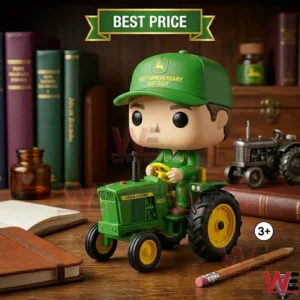 John Deere 190th Anniversary Pop Figure 1837-2027 4 A John Deere tractor figure on a desk with a pencil and books!
