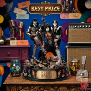 A collectible statue of four rock band members in makeup and costumes on a rocky base with a fiftieth anniversary plaque!