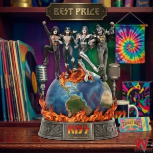 A statue of four rock musicians in black and silver costumes standing on a flaming Earth globe with an anniversary plaque!