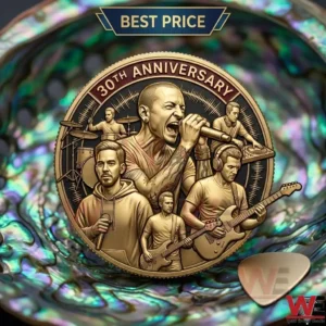 Engraved gold anniversary coin for a rock band shown inside a shimmering shell!