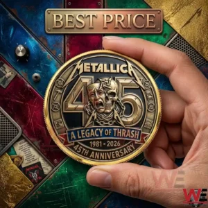 A person holding a circular Metallica legacy of thrash coin between two fingers!