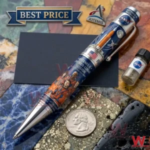 A NASA themed collector pen for the Artemis II mission shown with a silver quarter and space exploration accessories!