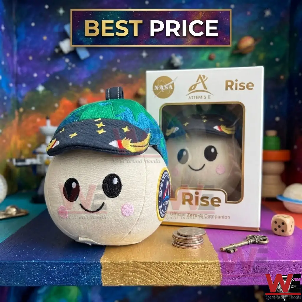NASA Artemis II Rise Zero G Mascot Plush 1 A collector plush toy for the Artemis mission shown with its official retail box on a colorful desk!