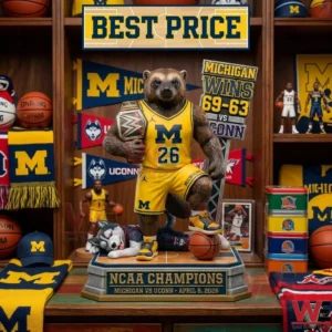 Michigan wolverine mascot statue in basketball gear celebrating an NCAA championship!