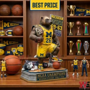 Michigan basketball championship statue with trophies and basketballs in the background!