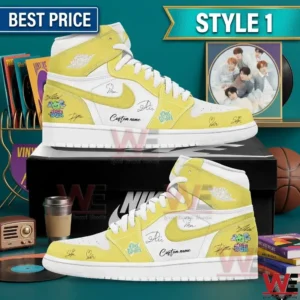 Side view of yellow and white high top sneakers with various artistic doodles and signatures displayed among retro objects!