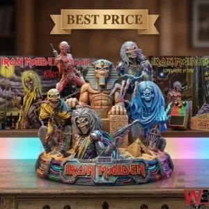 A large and detailed figurine grouping on a shelf featuring multiple versions of the character Eddie from Iron Maiden album covers including a central pharaoh figure on a throne.