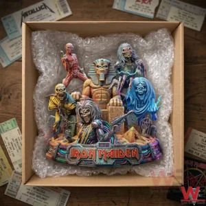 An overhead shot looking into an open cardboard box filled with protective bubble wrap holding the same complex multi figure Iron Maiden statue.