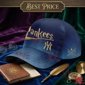 Blue gradient Yankees cap with gold wizarding world embroidery sitting on velvet cloth with old world props.