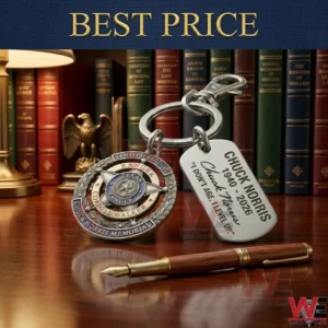 A silver Texas Ranger star keychain and an engraved Chuck Norris memorial tag resting on a dark wood library table next to a fountain pen!