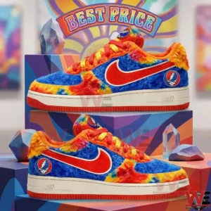 A pair of blue and orange fuzzy sneakers with a red logo on a colorful display!