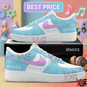 Custom light blue sneakers with a pink gradient logo and music group signatures!