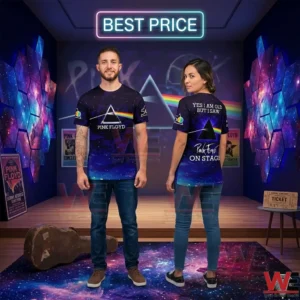 A man and woman modeling a Pink Floyd galaxy print t shirt in a music themed room!