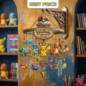 A detailed Pokemon themed wind chime with multiple character charms and silver tubes hangs indoors! It features Pikachu and other original characters along with 30th anniversary labels!