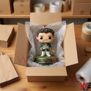 Overhead shot of a golf champion collectible figure packaged for shipping!