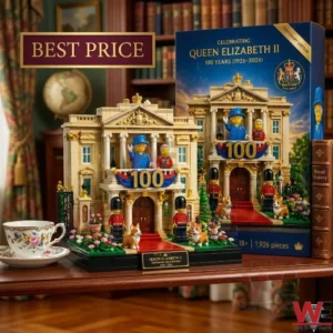A constructed building block model of a royal palace is shown with its packaging! Small figures of the royal family guards and corgis are positioned around the tan building! A floral tea cup sits on the wooden table!