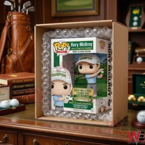 A product box for a golf collectible figure inside a shipping box with protective bubble wrap on a desk.