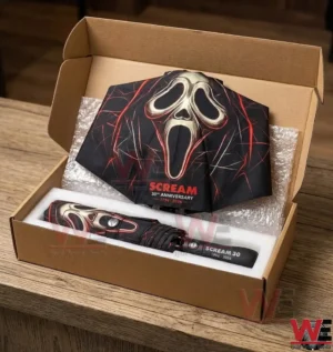 A Scream themed umbrella and sleeve packed for shipping inside a cardboard box with bubble wrap and foam padding!