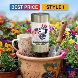 Patriotic solar garden light with Snoopy character in Uncle Sam outfit standing in a flower pot.