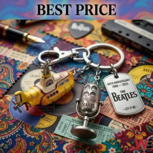 The Beatles 66th Anniversary collector keychain set on a background of music memorabilia and tickets!