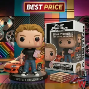 A Brian O Conner vinyl figure and orange Toyota Supra displayed next to a 25th anniversary collector box in a mechanical themed setting.