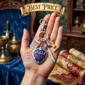 Close up of a Zelda 40th Anniversary keychain held in a hand against a fantasy themed background!