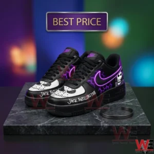 Custom black and purple sneakers with skull designs on a marble display!