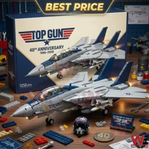 A grey and blue toy brick fighter jet model displayed with its anniversary box and loose building pieces on a wooden surface.