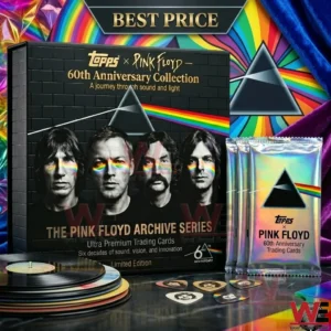 A detailed shot of a black Pink Floyd archive series collector box and several silver trading card packs on a dark surface with vinyl records and guitar picks!